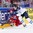 COLOGNE, GERMANY - MAY 21: Finland's Joonas Kemppainen #23 takes out Russia's Yevgeni Kuznetsov #92 along the boards while battling for the puck during bronze medal game action at the 2017 IIHF Ice Hockey World Championship. (Photo by Andre Ringuette/HHOF-IIHF Images)

